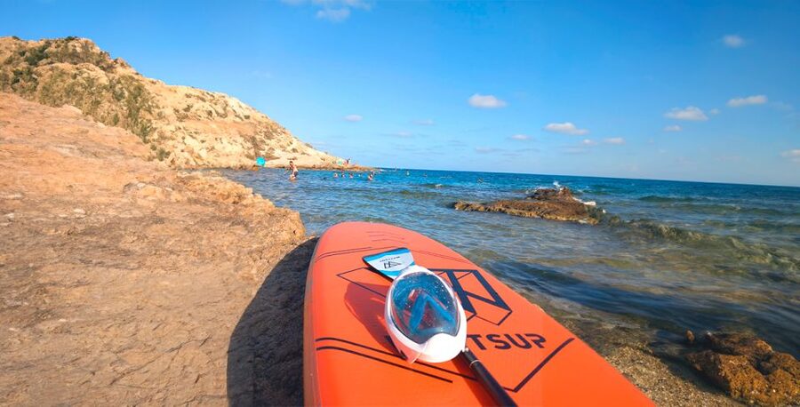Alicante: E-Bike, Snorkeling and Paddle Surf Tour - Paddle surfing at Playa del Postiguet