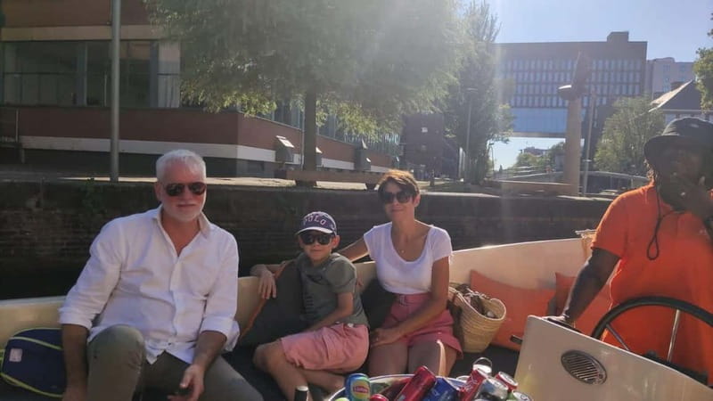 Amsterdam bike tour with a French-speaking guide local! - Dam Square and Westerkerk