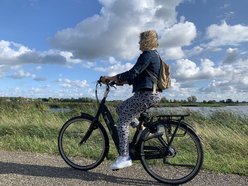Amsterdam: Countryside Bike Tour and Zaanse Schans Windmills - Wetlands shaped by water and painted by Monet