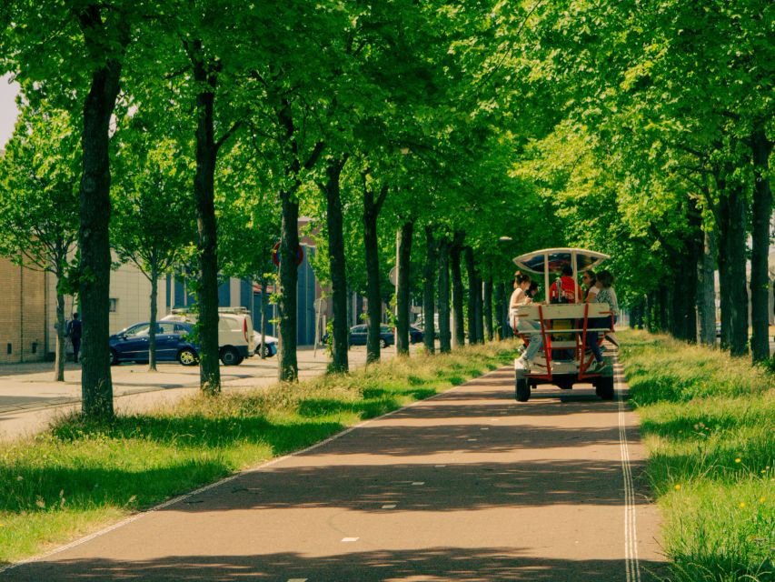Amsterdam: Dutch Beer Bike Blast Tour with Onboard Bar - Weather Protection and Practical Comfort