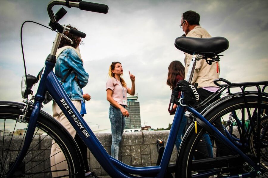 Amsterdam full day tour: Walking, Biking & Cruising - Starting at Beursplein and entering the old center