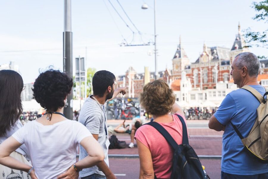 Amsterdam full day tour: Walking, Biking & Cruising - Waiting for the boat and cruising the canal ring