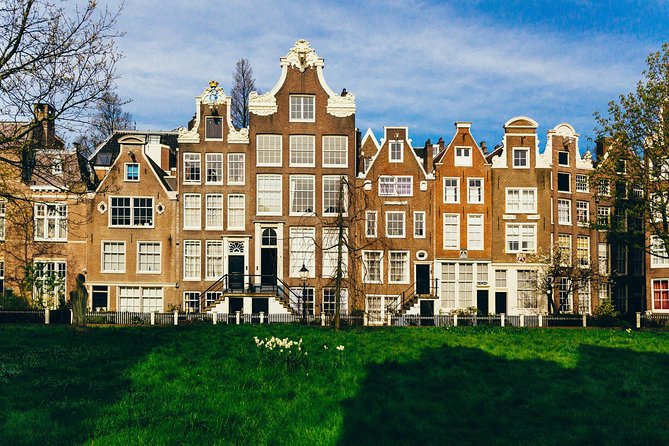 Amsterdam Private Tour: Highlights & Hidden Gems by Bike or Foot - Dutch snacks at a local favorite