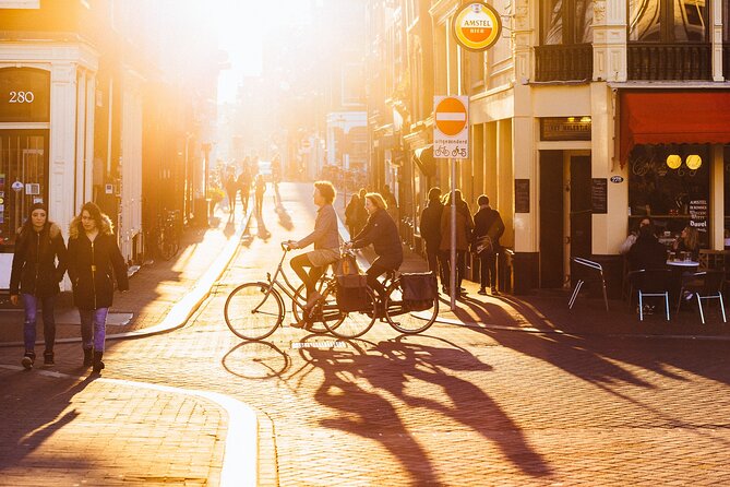 Amsterdam Private Tour: Highlights & Hidden Gems by Bike or Foot - Dam Square and the Royal Palace