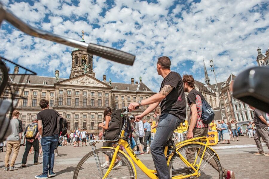 Amsterdam: Relaxed City Highlights Guided Bike Tour - Bikes, family needs, and weather