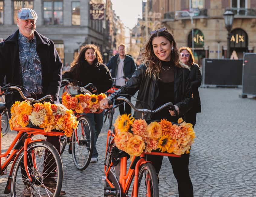 Amsterdam: Top Highlights Guided Bike Tour - What the guides add