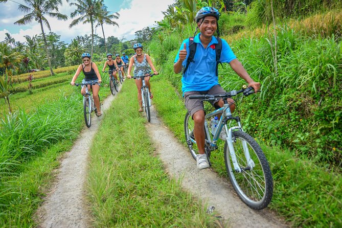 Bali Countryside Cycling Tours - Riding through Pakudui Village and local compounds