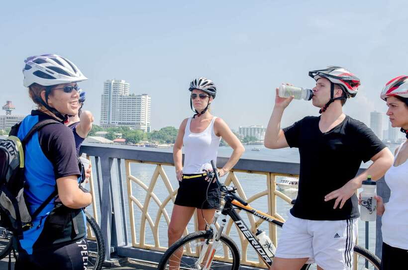 Bangkok: Backstreets and Historic Temples Bike Tour - What the guides and bikes add to the experience
