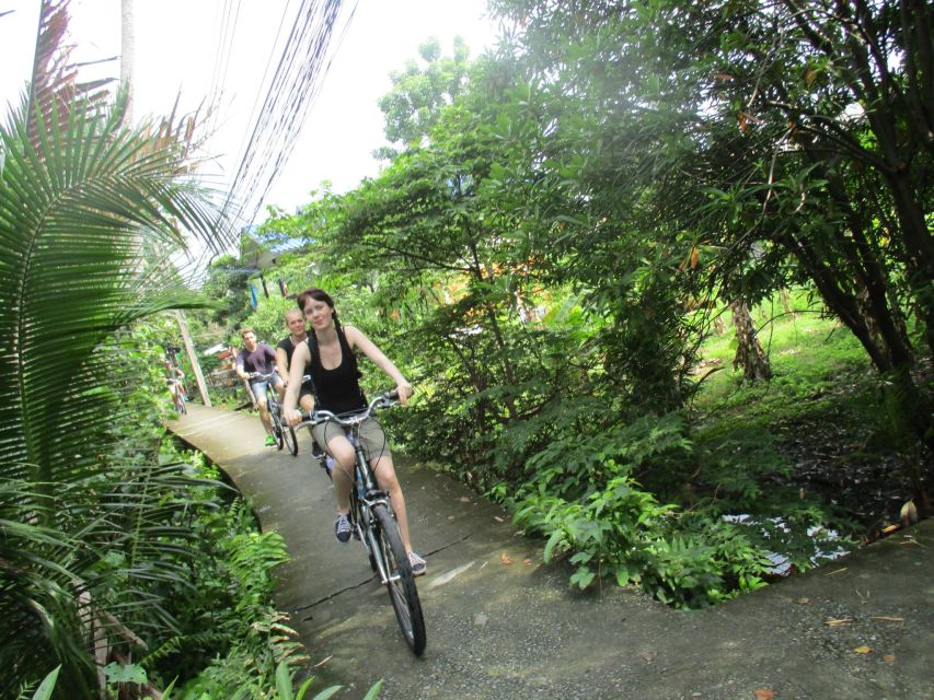 Bangkok Full-Day Bike Tour with Boat Transfer and Lunch - Returning to the heat and high-rises