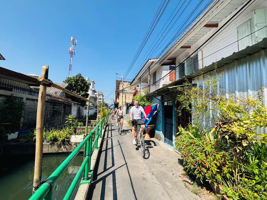 Bangkok: Temples, Canals & Local Life Bike Tour - Heat, rain, and timing deserve attention