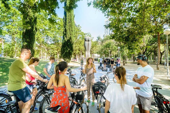 Barcelona E-Bike Small Group Tour with Tapas & Wine Tasting - Port Vell, Columbus Monument, and La Rambla