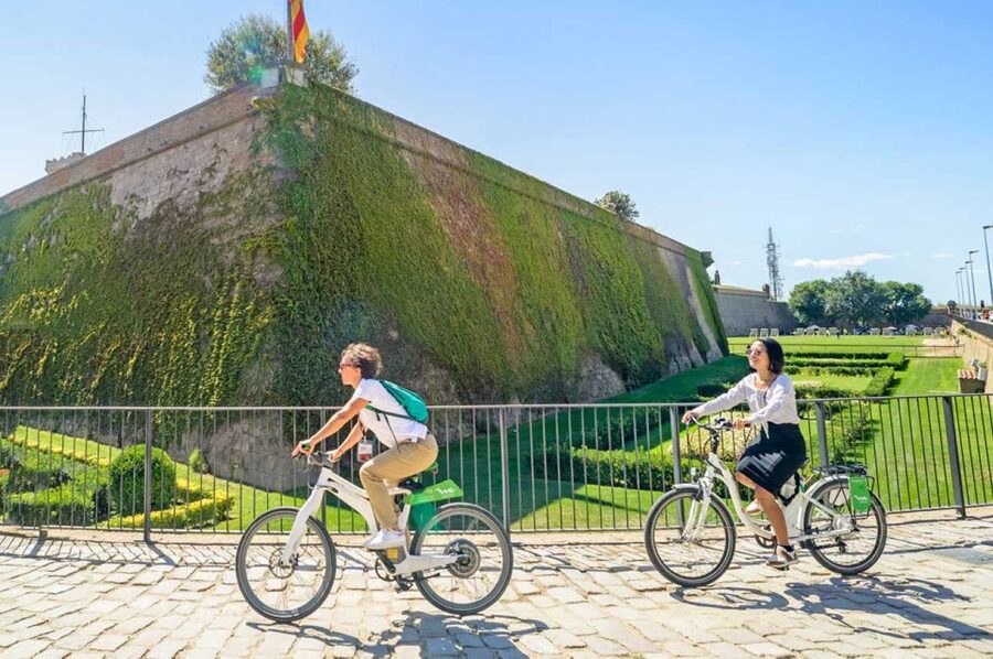 Barcelona: E-Bike Tour with Montjuic Cable Car & Boat Ride - Seeing the coastline from a boat