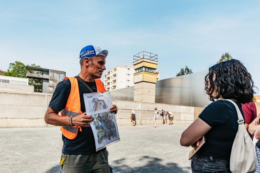 Berlin: Cold War & Berlin Wall History Guided Bike Tour - Riding toward Brandenburg Gate