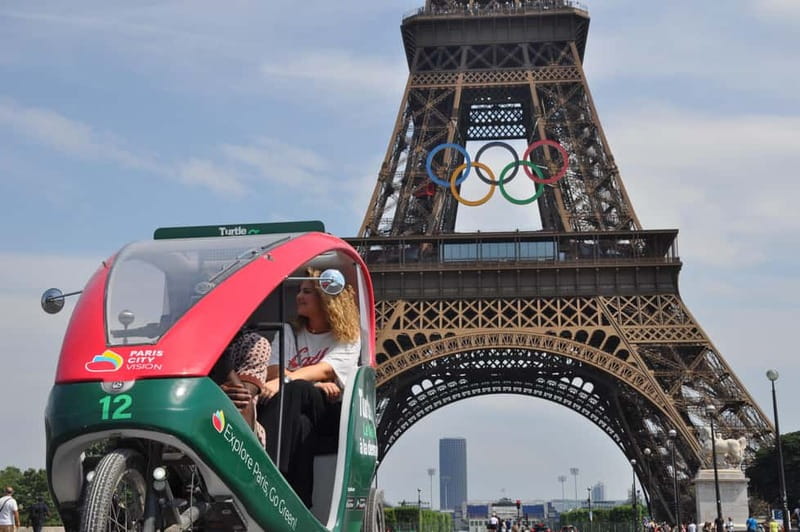 Best of Paris Private Rickshaw bike Tour with guide - Following the Seine toward the Eiffel Tower