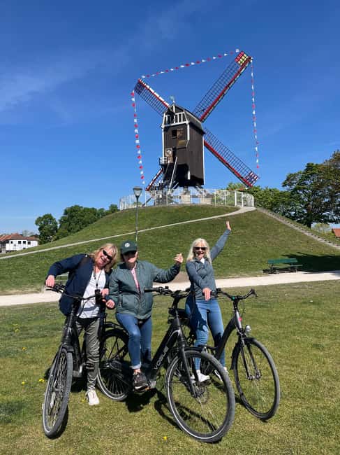 Bruges: Guided Bike Tour with a Local to Sights & Secrets - Market Square, the Belfry, and Bruges at close range
