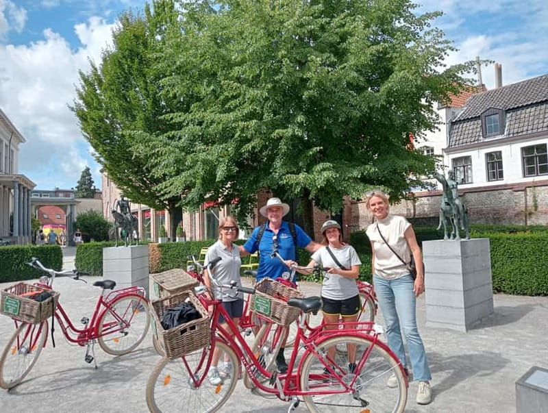 Bruges: Guided Retro Bike Tour of Highlights and Hidden Gems - The central landmarks: Holy Blood, Belfry, and Market Square