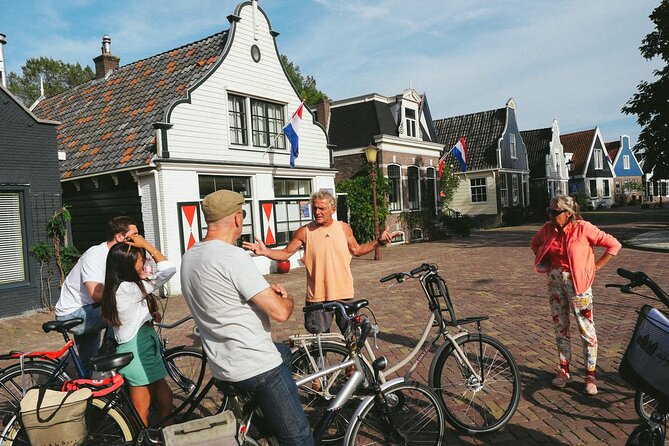 Cheese, Canals & Windmill Countryside E-Bike Tour Amsterdam - Leaving Amsterdam by ferry and bicycle