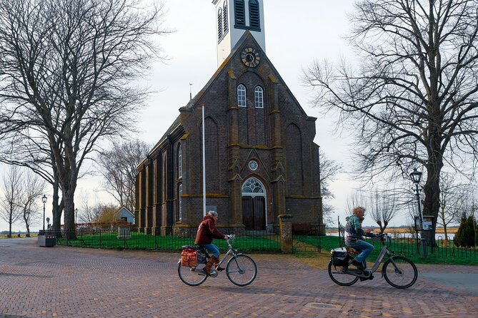 Cheese, Canals & Windmill Countryside E-Bike Tour Amsterdam - Cheese tasting, clogs and the most social stop
