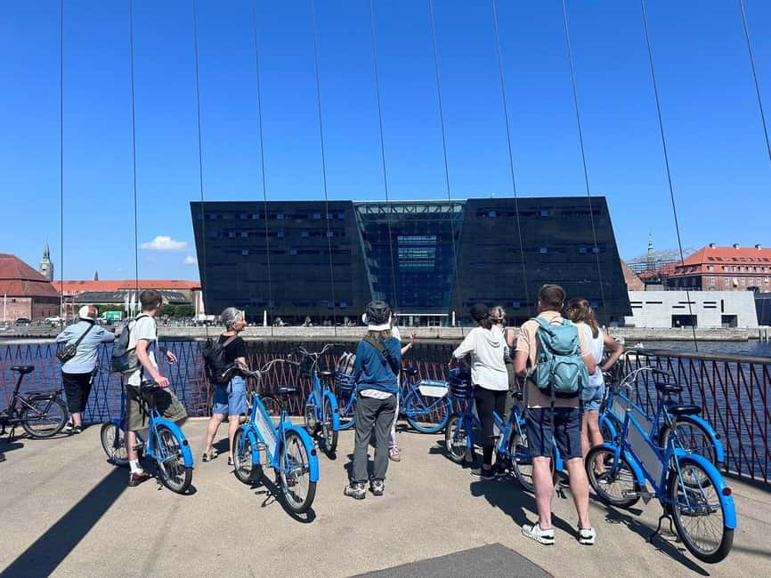 Copenhagen: 2-hour City Highlights Bike Tour - Amalienborg explains the royal present