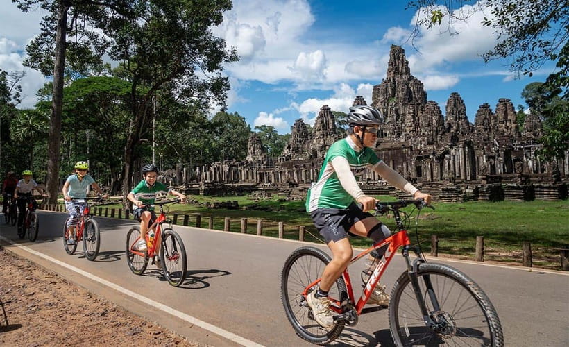 Cycle Angkor Backroad Bike Tour / E-Bike or Tuk Tuk - Entering Angkor Thom through the stone faces