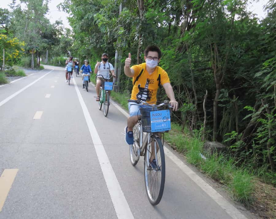 Explore Bangkok jungle by bike, kayak & boat - small group - Kayaking beside homes, palms, and Klong Toey Port