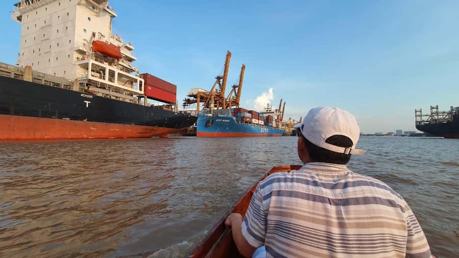 Explore Bangkok jungle by bike, kayak & boat - small group - The longtail boat view of Bangkok’s working river