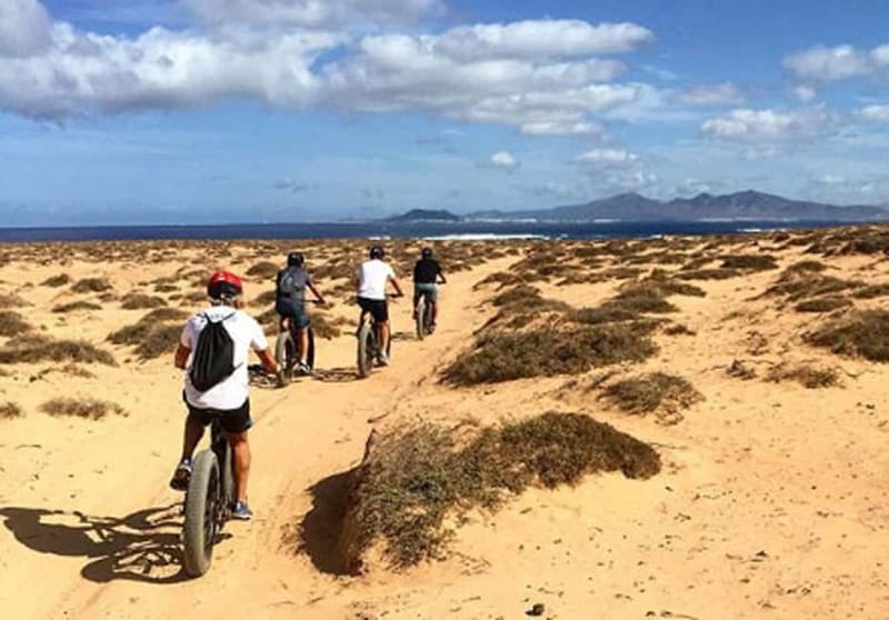 From Corralejo: Fuerteventura Guided E-Bike/E-scooter Tour - Lajares and the useful café stop