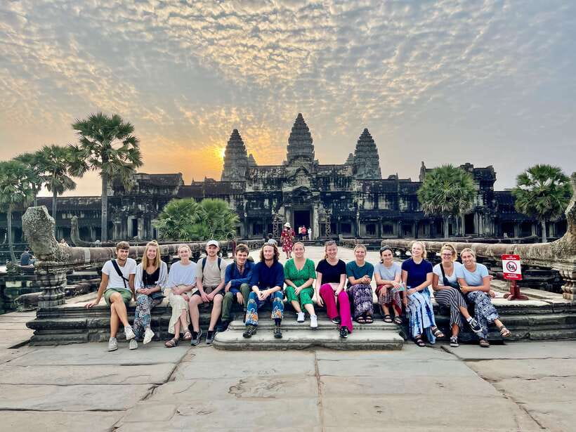 From Siem Reap: Angkor Wat Sunrise and Temples E-Bike Tour - Ta Prohm shows nature pressing through the ruins