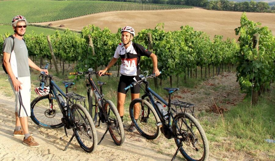 From Siena: Chianti Countryside E-Bike Tour w/ Lunch & Wine - Monteriggioni and its medieval walls