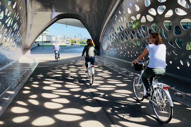 Guided Bike Tour: 2 Hours Highlights of Antwerp - Street riding turns a list of sights into a city