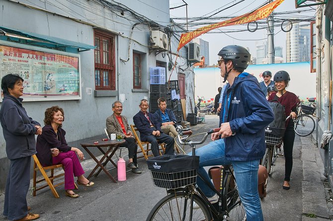 Half-Day Bike Tour of Shanghai Old Town with Food Tasting - What the guides add to the experience