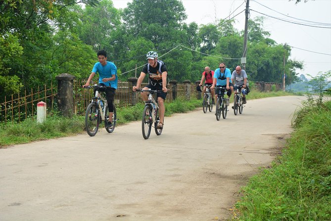 Hanoi Bicycle Tours: Half Day Bicycle Tours Hanoi Countryside - A broom workshop and the work behind everyday objects