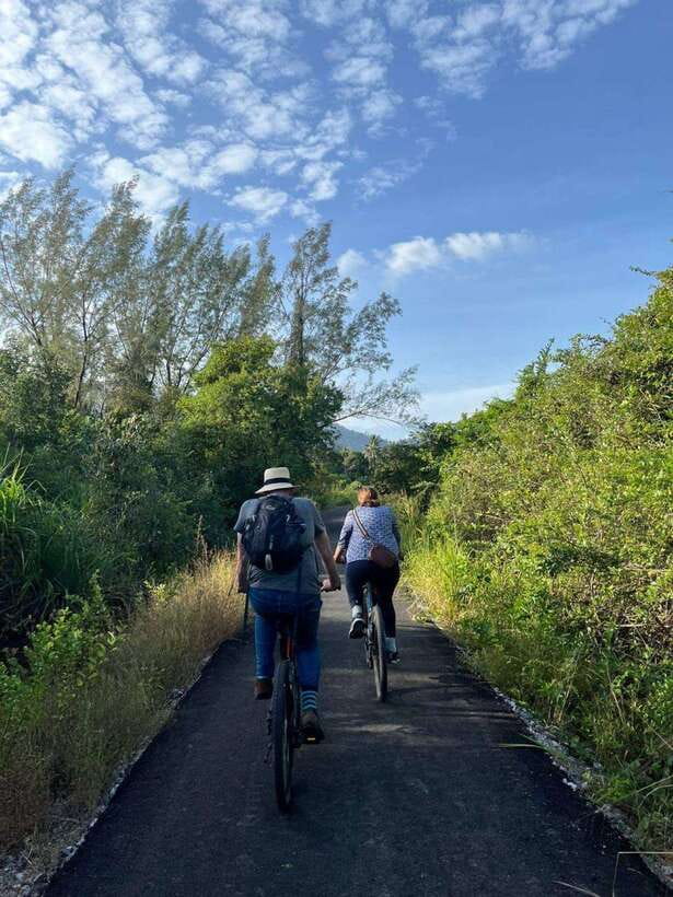 Langkawi: Countryside Bike Tour, Waterfall Swim & Dessert - Cycling through villages, fields, and everyday life
