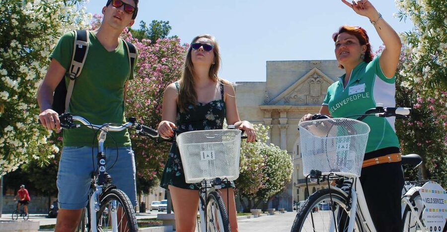 Lecce: City Highlights Guided Tour by Bike - Piazza Sant’Oronzo and the Roman amphitheater