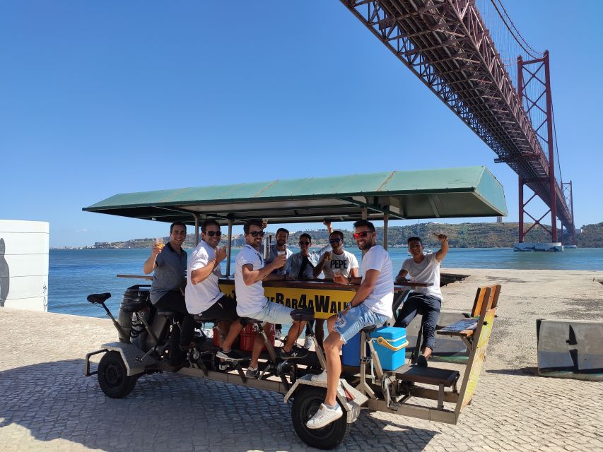Lisbon: 1-Hour Beer Bike Tour with Draft Beer & Sangria Ride - Monuments, music, and the bridge photo stop