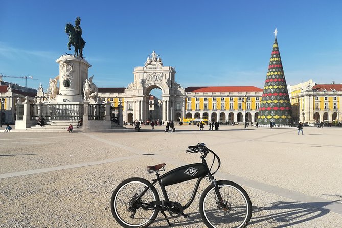 Lisbon Regular or Electric Bike Rental - Alfama, Sé Cathedral, and tram traffic