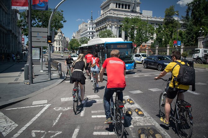 Madrid: 3 hour Guided Highlights Bike Tour with Optional Tapas - What the guides add to the ride