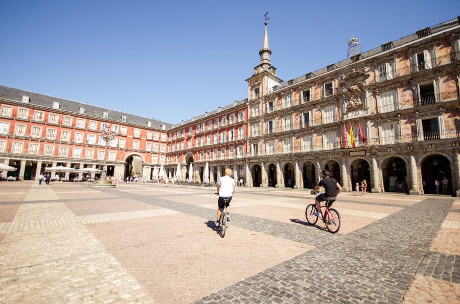 Madrid City Guided Bike/E-Bike Tour for Small Groups - Exiting through Alcalá Gate and crossing Salamanca