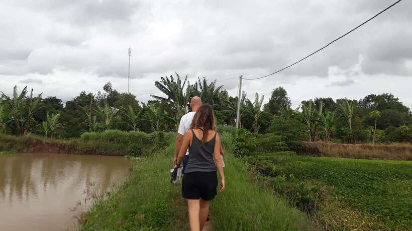 Mekong Day Tour by Car:Cai Be market, Local Island & Cycling - A home-cooked lunch around noon