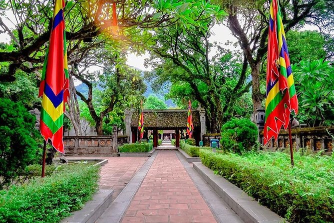 Ninh Binh Tour: Deluxe & Small Group Tam Coc Hoa Lu - Boat, Biking, Buffet Lunch - Tam Coc by traditional wooden boat