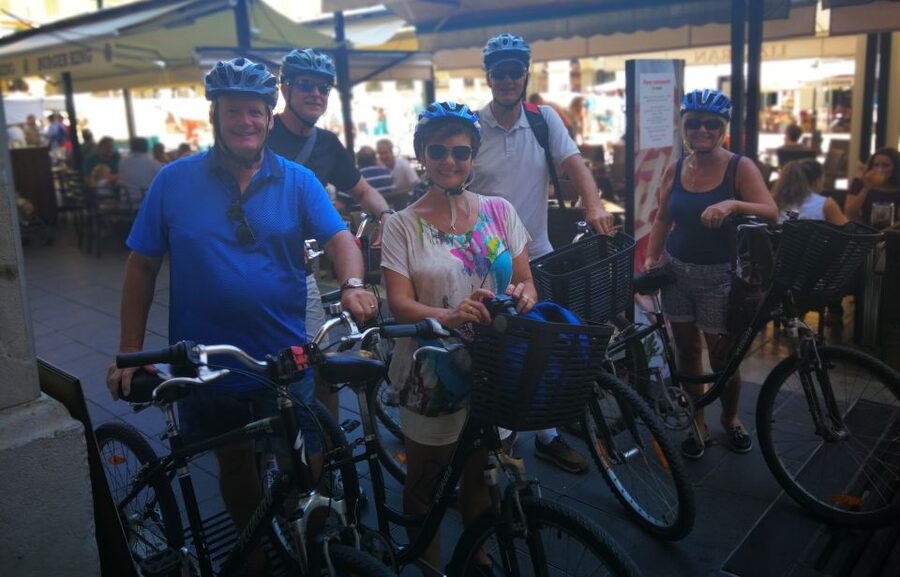 Palma de Mallorca: Guided Bicycle Tour with Tapas & a Drink - Riding the seafront toward La Seu