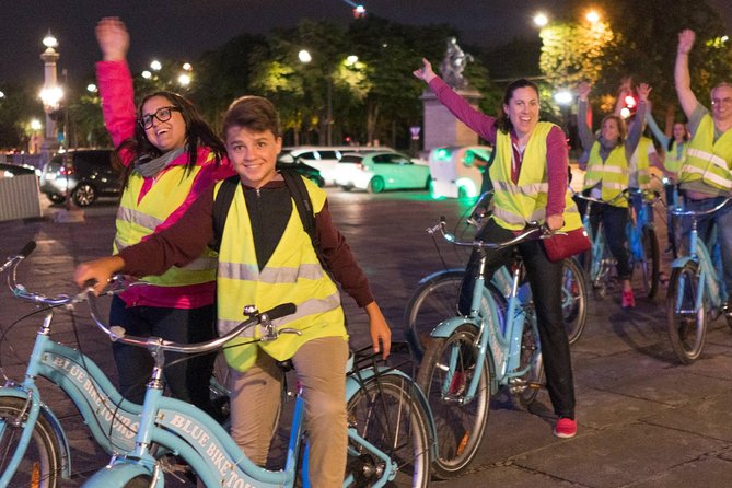 Paris Evening Bike Tour with 1-hour Seine River Cruise - Riding around the Louvre Pyramid