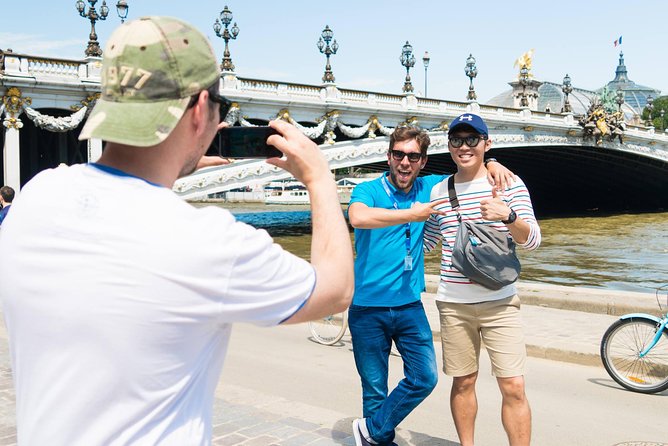 Paris Highlights Bike Tour: Eiffel Tower, Louvre and Notre-Dame - Grand Palais, Champs-Élysées, and Invalides