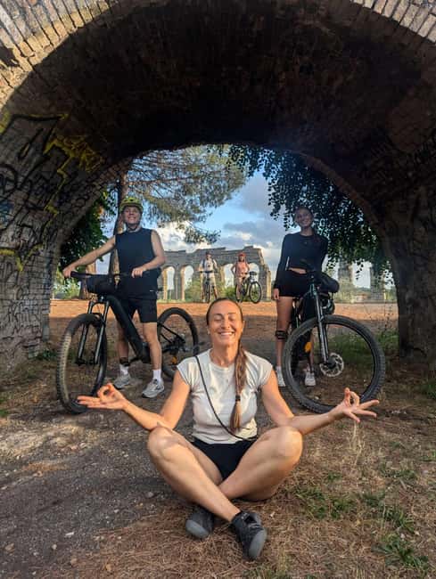 Rome: Appian Way, Catacombs & Aqueducts by eBike + Transfer - Riding the Appian Way on ancient paving