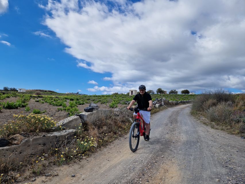 Santorini: E-Bike Sunset Tour Experience - Emporio castle and old Cycladic lanes