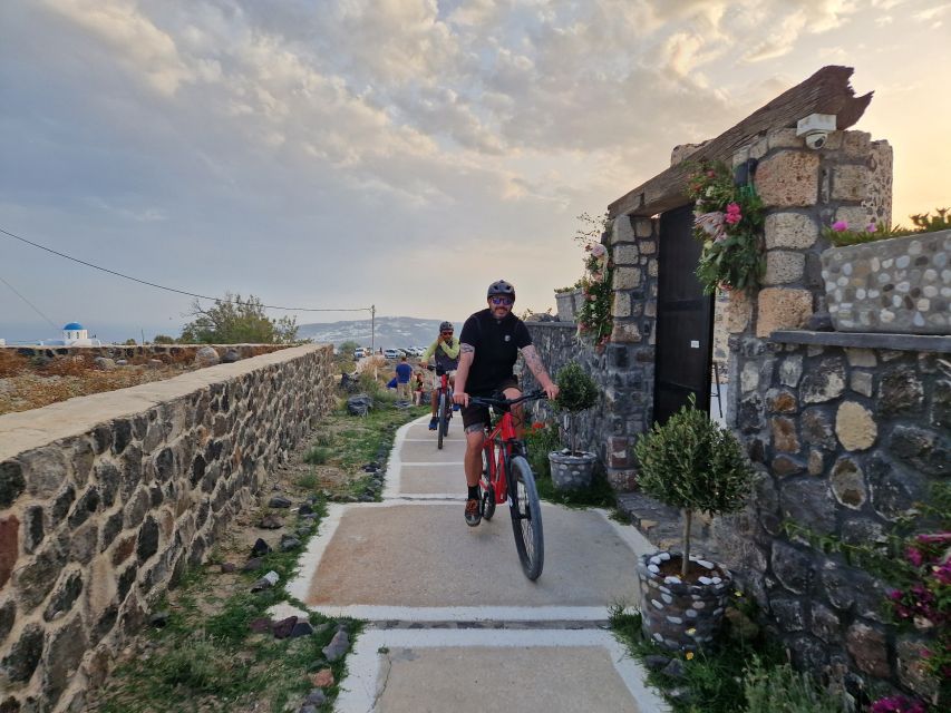 Santorini: E-Bike Sunset Tour Experience - Starting with Santorini’s tomato story
