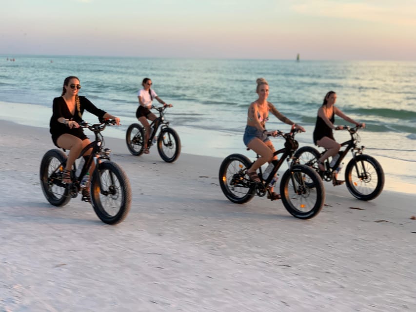 Sarasota: Siesta Key Electric Bike Sunset Tour - Champagne, a flag ceremony, and a quieter ending