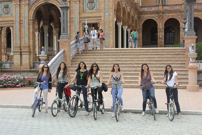Seville Bike Tour with Full Day Bike Rental - Crossing to Triana and the Guadalquivir