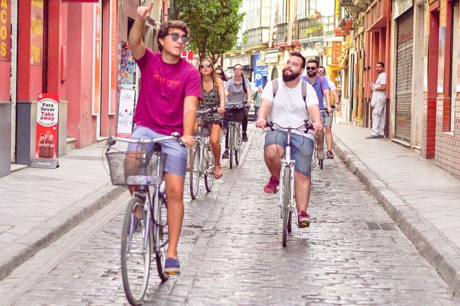 Seville: City Sightseeing and Local Culture Bike Tour - Triana and the Guadalquivir River