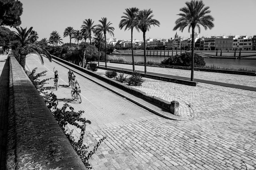 Seville: City Sightseeing and Local Culture Bike Tour - Local stories instead of a formal lecture
